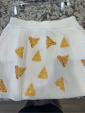 QUEEN OF SPARKLES White Knit Mini Skirt with Gold Sequin tortilla chips